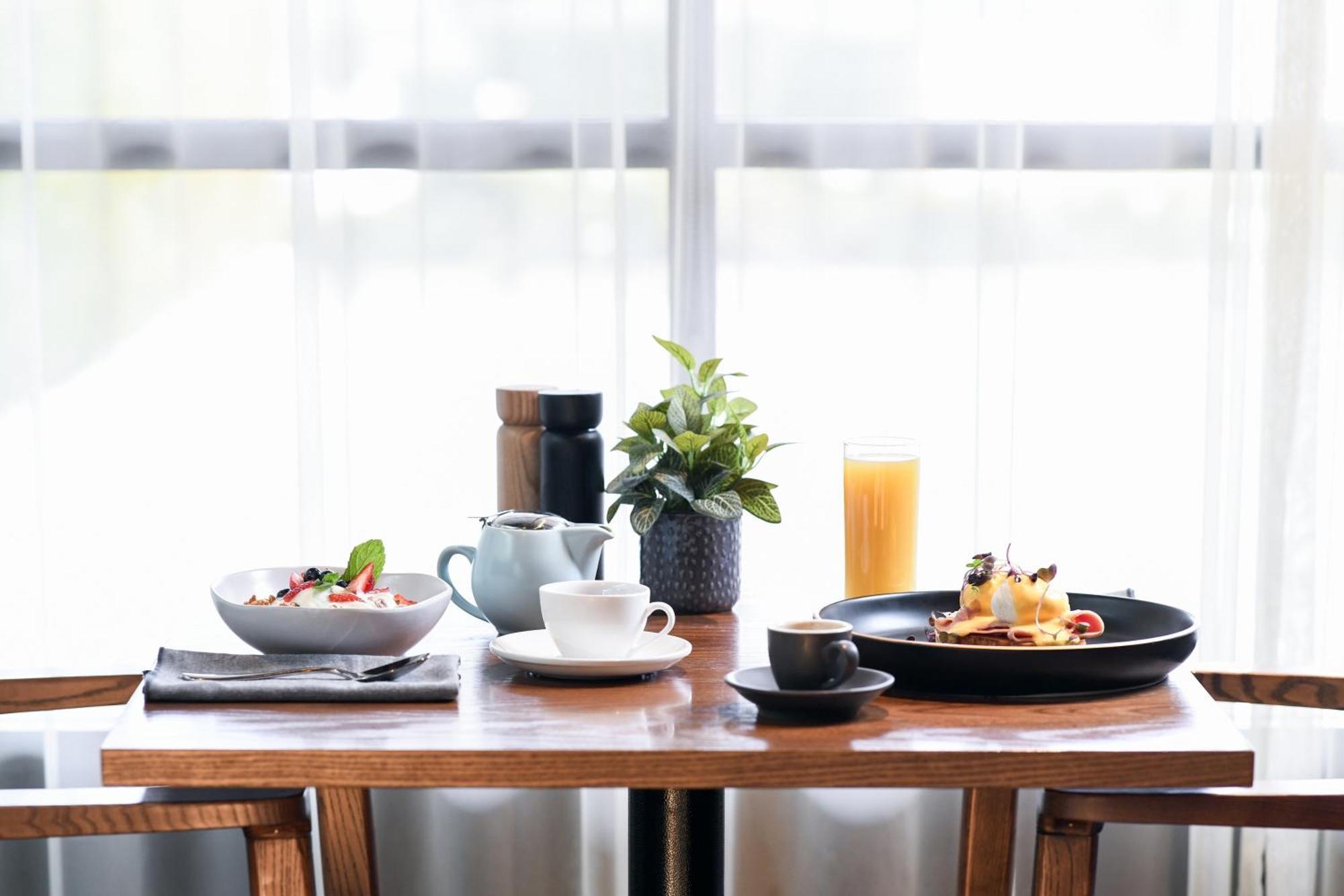 Powerhouse Hotel Tamworth By Rydges Eksteriør billede A breakfast table